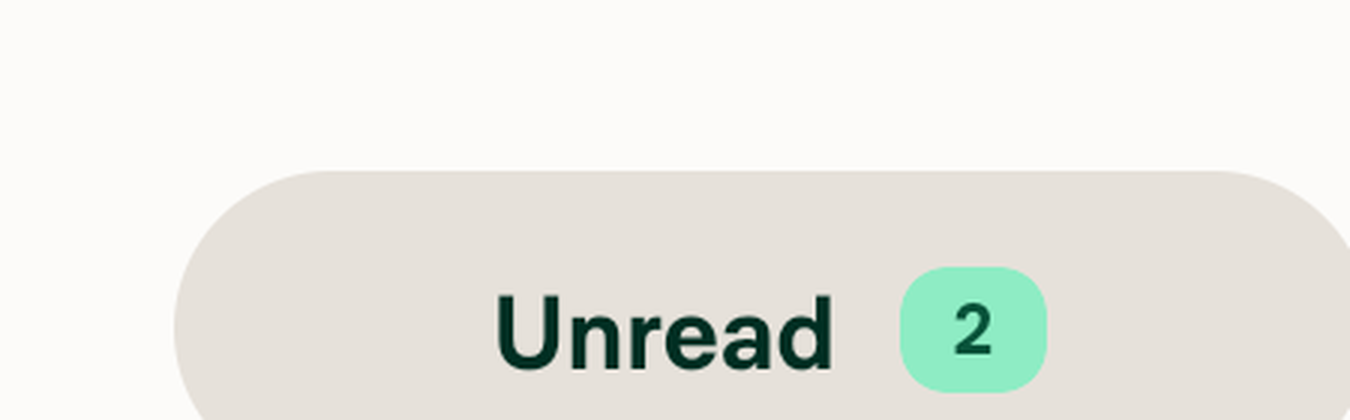 Zoom of pill at font_scale 1.3, still centered and unclipped